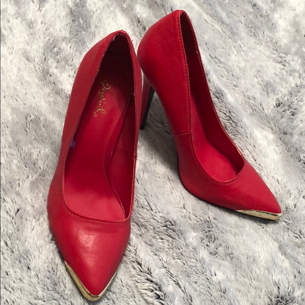 Red pointed heels